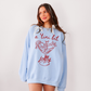 A 'Tini Bit Jolly Sweatshirt